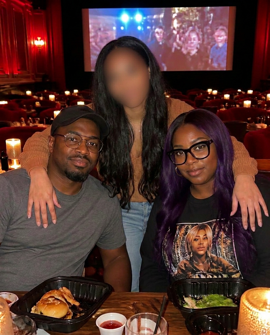 A couple sharing a first date over dinner at a dine-in movie theatre